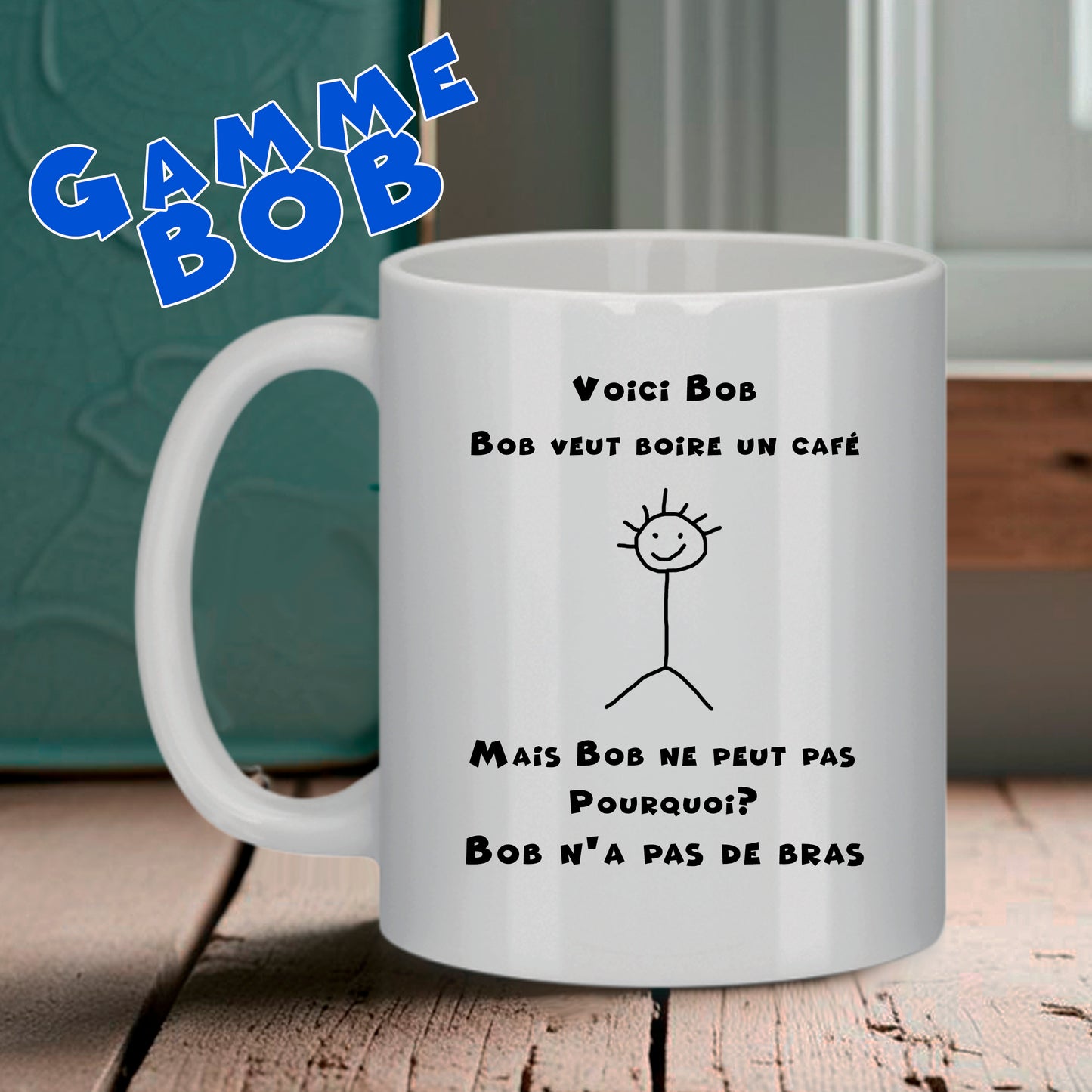 Mug rigolo Bruhle représentant un bonhomme bâton et le texte "Bob veut boire un café mais bob ne peut pas pourquoi? bob n'a pas de bras", humour noir minimaliste.