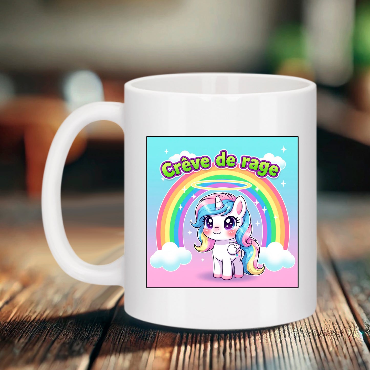 Mug blanc Bruhle avec une illustration carrée d'une petite licorne mignonne sous un arc-en-ciel avec le texte vert et rose Crève de rage.