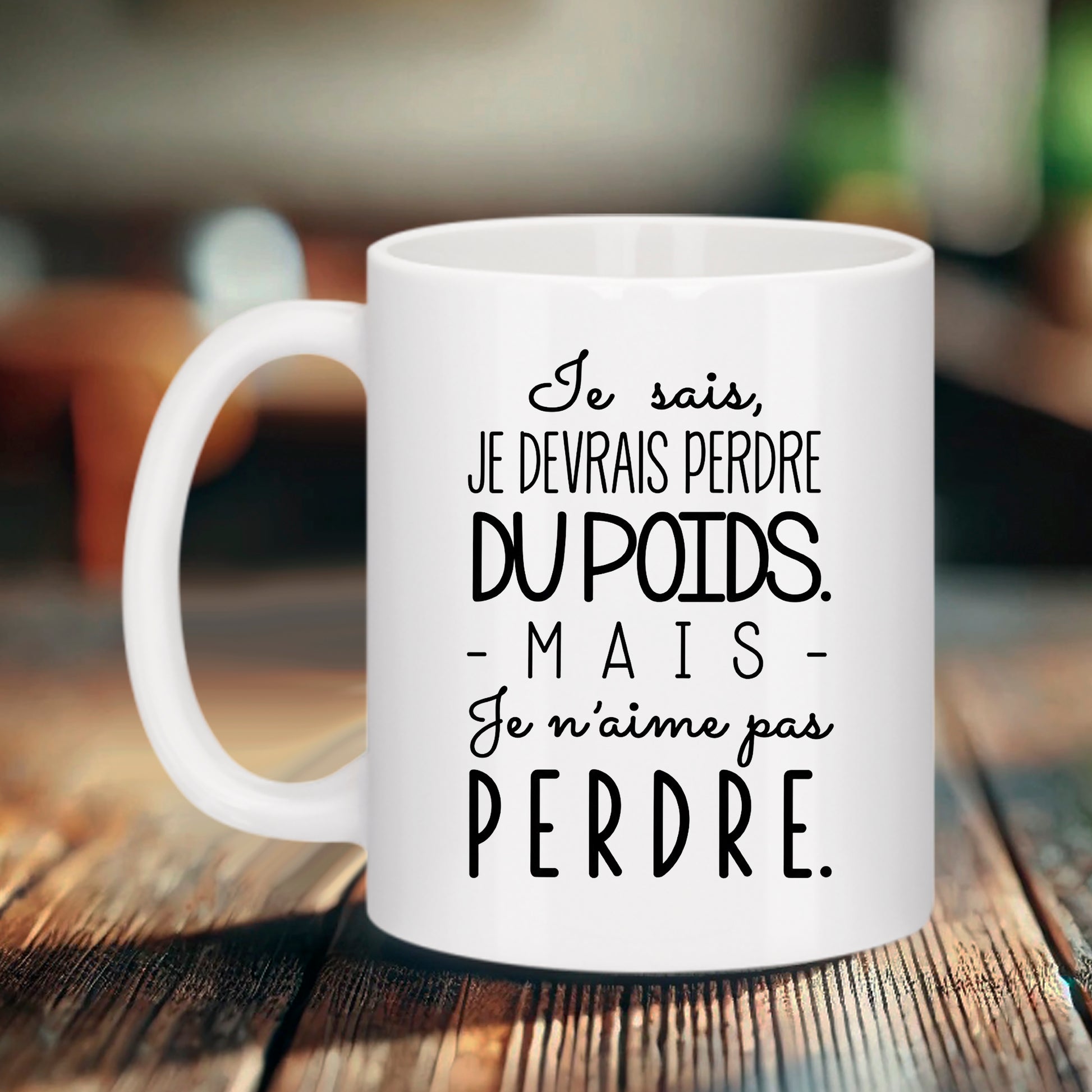 Mug blanc Bruhle avec texte noir stylisé : Je sais, je devrais perdre du poids. - MAIS - Je n'aime pas perdre.